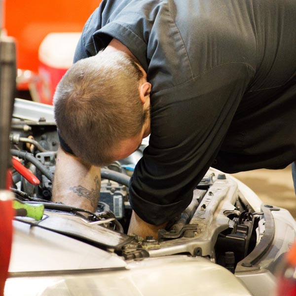 car tech working on car